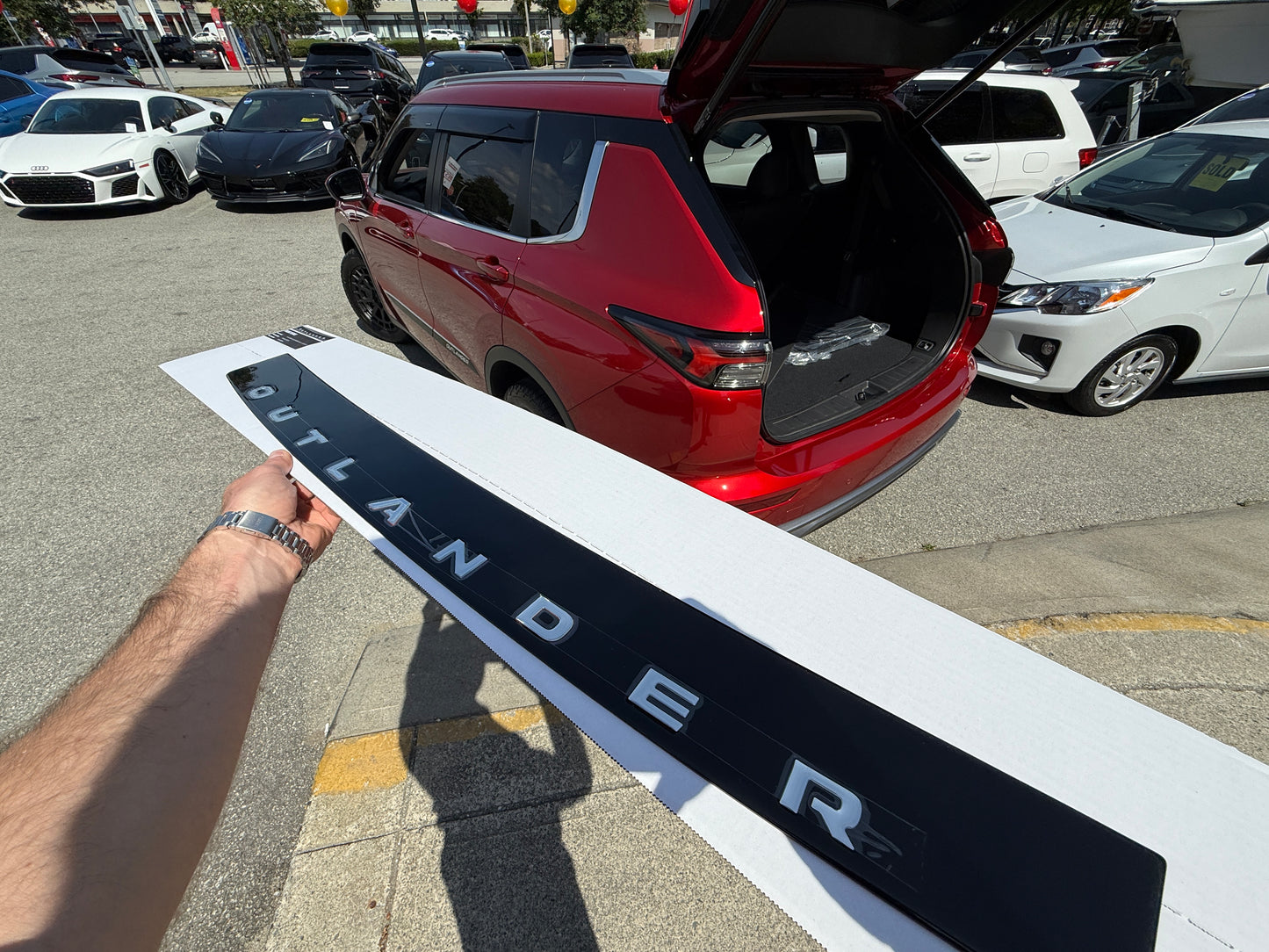 Outlander bumper protector plate with lettering