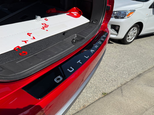 Outlander bumper protector plate with lettering