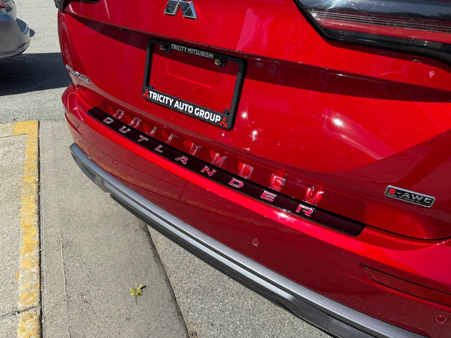 Outlander bumper protector plate with lettering
